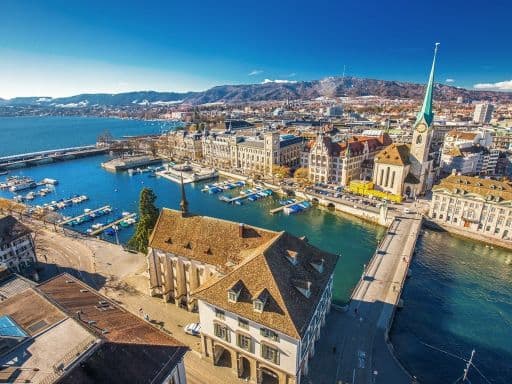 Fraumunster Church, Limmat river and Zurich lake from Grossmunster Church